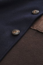 Close-up front view of the Doppiaa Jacket 'Aarneis' navy showing doubleface jersey made of cashmere, virgin wool, and microfiber, very soft feel, regular fit, five-button placket, turn-down collar, slanted welt pockets, sleeve cuffs with button tab, half 