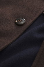 Close-up front view of the Doppiaa Jacket 'Aarneis' dark brown showing a dark button on doubleface jersey made of cashmere, virgin wool, microfiber, very soft feel, regular fit, five-button placket, turn-down collar, slanted welt pockets, sleeve cuffs wit