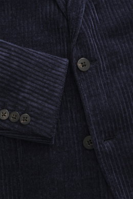 Close-up front perspective of the 04651/ A trip in a bag Cord Blazer navy showing cord microfiber, slim fit, two-button style, notched lapel, patch hip pockets, side label, rear vents, buttoned cuffs, unconstructed design, and inner pockets.