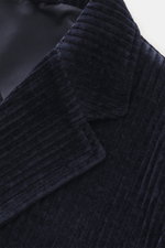Close-up front view of the navy cord fabric and notched lapel of the 04651/ A trip in a bag Cord Blazer navy, slim fit with tailored two-button style, made of high-quality microfiber cord with light elastic quality, featuring patch hip pockets, small wove