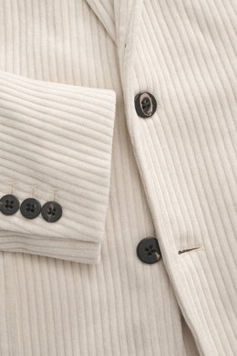 Close-up front view of 04651/ A trip in a bag Cord Blazer sand showing corduroy microfiber fabric, black buttons on sleeve cuffs, notched lapel, slim fit, tailored two-button style, patch hip pockets, small woven label in side seam, rear side vents, uncon