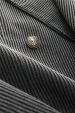 Close-up front view of the Brunello Cucinelli Cord Blazer Anthracite showing corduroy pure cotton fabric with soft touch, brushed effect, crest button, slim fit, double-breasted three-button style, notched lapel, classic breast pocket, hip pockets with fl