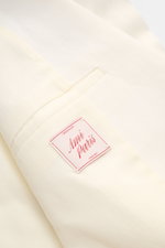 Close-up front view of Ami Paris Smart-casual jacket cream showing fabric texture and inside label, highlighting viscose-linen blend.