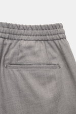Marco Pescarolo Woll-Jogpants 'Chiaia' grau meliert, Detailaufnahme von hinten oben, elastischer Bund, paspelierte Gesäßtasche, reine Schurwolle.