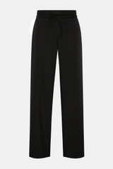 Ami Paris Jogger pants black shown from the front on a plain background, featuring a high waist, elasticated waistband with drawstring, zip and waist button, French pockets, patch back pockets, slight taper, loose fit in pure virgin wool. Trendy oversized