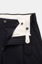 Alt tag (125 characters max):
Close-up front view of PT Torino Wool trousers 'Union Fit' navy showing waistband, buttons, zipper, and inner lining details.

Description:
<p>The 'Union Fit' from trouser specialists PT TORINO is the perfect choice for the c
