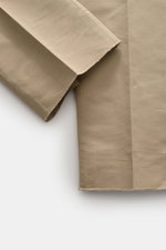 PT Torino Trousers 'Gentleman Fit' beige shown from a close-up side perspective, highlighting the linen and cotton blend fabric's slight robustness and lightweight feel, with features including double pleats, tapered cut, zip and waist buttons, extended b