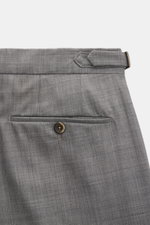 PT Torino Wool trousers 'Gentleman Fit' grey mottled shown from close-up rear side, highlighting buttoned jetted pocket, side adjuster and fine wool texture. <p>For the exclusive trousers 'Gentleman Fit', PT TORINO has chosen virgin wool in lightweight Su