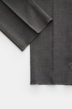 PT Torino Wool trousers 'Gentleman Fit' dark grey mottled shown from a top-down perspective, highlighting the lightweight Super 130'S virgin wool fabric with a soft feel, slim fit, tapered cut, double pleat, French pockets, watch pocket with flap and butt
