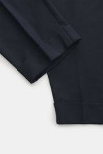 Marco Pescarolo Woll-Jogpants 'Varenne' navy, Detailaufnahme der knöchellangen, schmal zulaufenden Hose mit fixiertem Saumaufschlag, reine Wolle, softer Griff.