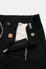 Marco Pescarolo Woll-Jogpants 'Caracciolo' schwarz, Detailaufnahme von Bund und Reißverschluss, Schurwolle mit Cashmere, elastischer Bund mit Tunnelzug.