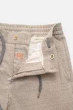 Marco Pescarolo Woll-Jogpants 'Caracciolo' beige meliert, Detailansicht von vorne mit offenem Bund, elastischer Bund, Tunnelzug, Zip Fly, Knopf.