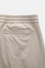 Marco Pescarolo Cashmere Jogpants 'Caracciolo' beige meliert, Detailansicht von hinten oben, elastischer Bund, Zipper-Gesäßtasche, tonales Karo, reiner Cashmere.