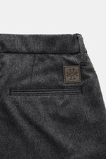 Jacob Cohen Wool pants 'Jannik' dark grey melange shown from the back waist, featuring welt back pockets and a small calf leather patch. Precise Italian craftsmanship creates a bestseller for the contemporary men's wardrobe with noble wool pants made of s