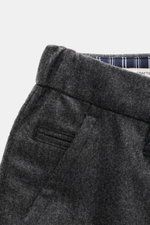 Close-up front-angle view of Jacob Cohen Wool pants 'Jannik' dark grey melange showcasing slim fit, elastic waistband, French pockets, and soft wool fabric. 

Description: <p>Precise Italian craftsmanship - that is what the label JACOB COHEN stands for, c