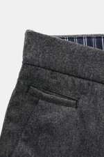 Jacob Cohen Wool Trousers 'Bobby' Dark Grey Mélange shown close-up from a top angle, highlighting fine wool texture, welted back pocket, and striped waistband lining. Precise Italian craftsmanship – that's what the label JACOB COHEN stands for, creating a