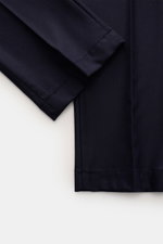Close-up photo from above of Jacob Cohen Wool Pants 'Bobby' Dark Navy showing slightly elastic wool fabric and detailed stitching on hem.