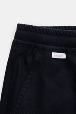 Detailaufnahme der 04651/ A trip in a bag Woll-Jogpants 'Flannel Pants' navy von oben, elastischer Bund mit Tunnelzug, französische Taschen.