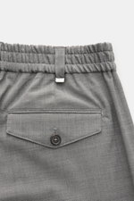 PT Torino Hose 'The Rebel' grau meliert, Rückansicht mit geknöpfter Gesäßtasche, elastischem Bund, Woll-Microfaser-Mix, atmungsaktiv und komfortabel.