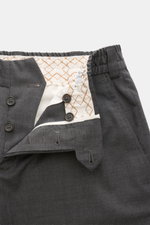 Close-up front view of PT Torino Trousers 'The Rebel' dark grey mottled showing button fly, elastic waistband, and patterned inner lining.

Description: <p>'The Rebel' from trouser experts PT TORINO is guaranteed to be your faithful companion for spring a
