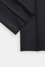 Close-up front-side view of Berwich Wool Pants 'Retrolong' navy showing fine twill pure wool fabric, open hem, and soft glossy texture.