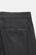 Berwich Wool Pants 'Retrolong' anthracite shown from the back waist, featuring pure wool twill, regular fit, welt pockets, button tab, and soft glossy texture.