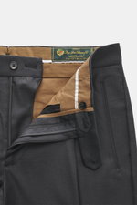 Close-up front view of Berwich Wool Pants 'Retrolong' anthracite showing zipper, button, and inner waistband details with brown lining.