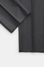 Close-up top view of Berwich Wool Pants 'Retrolong' anthracite showing pure wool twill fabric with soft touch, slightly glossy, and open hem.

Description: <p>The wool pants 'Retrolong' by BERWICH impress with a casual regular fit, made of pure wool and s