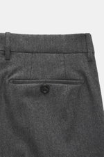 Close-up rear view of Berwich Wool Trousers 'Retrolong' dark-grey showing piped welt pocket with button, soft wool-cashmere fabric.

<p>The wool trousers 'Retrolong' by BERWICH impress with a casual regular fit, made from wool and cashmere in a stylish de