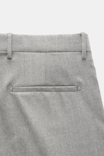 Close-up rear view of Berwich Wool Pants 'Chiaia' Grey Mélange showing pure wool fabric, welt back pocket, belt loops, and smooth texture, highlighting Italian tailoring with tapered fit, slightly elastic virgin wool, zipper and waistband buttons, extende