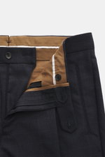 Berwich Wool pants 'Retrolong' navy checkered shown from close-up front top view with open zipper, button tab, and brown inner lining, pure wool.