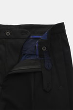 Santaniello Wollhose 'Arsenio' schwarz, Detailaufnahme von Bund und Innenfutter, reine Wolle, glatter Griff, Carrot Fit, paspelierte Taschen, knöchellang.