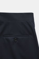 Close-up image of the back waistband and pocket of Lardini Trousers navy, photographed from a top-down perspective, made of pure viscose, regular fit, straight cut, with zipper and waistband hook, French pockets, small watch pocket, piped back pockets wit
