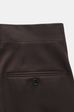 Lardini Trousers dark brown shown from the back waist, pure viscose, regular fit, straight cut, zipper and waistband hook, French pockets, small watch pocket, piped back pockets with button, open length.
