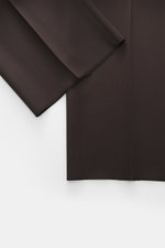 Lardini Trousers dark brown shown from a close-up top-down perspective, highlighting pure viscose fabric, regular fit, straight cut, zipper and waistband hook, French pockets, small watch pocket, piped back pockets with button, and open length.
