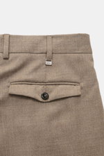 Close-up rear view of PT Torino Wool Trousers 'Rebel Fit' taupe melange showcasing waistband, belt loops, buttoned back pocket, and soft virgin wool fabric.