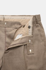 Close-up front view of PT Torino Wool Trousers 'Rebel Fit' taupe melange showing zipper, waistband hook, and fabric texture. Comfort meets stylish casualness: The 'Rebel Fit' trousers by PT TORINO impress with stretch virgin wool and high-quality craftsma