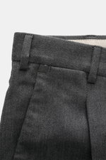 PT Torino Pants 'Rebel Fit' dark grey patterned shown from a close-up front angle, highlighting fine herringbone cotton-wool fabric, tapered fit, waistband, zipper, hook, and belt loops, with a soft touch and stylish design. With PT TORINO, you are always