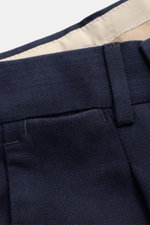 Close-up from above of PT Torino Pants 'Rebel Fit' navy patterned showing soft cotton-wool blend with fine herringbone, zipper, waistband hook, and belt loop details.