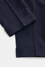 Close-up front view of PT Torino Pants 'Rebel Fit' navy patterned with fine herringbone cotton-wool fabric, tapered fit, and fixed hem cuff.