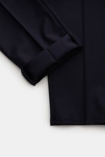 Close-up top view of Brunello Cucinelli Wool pants 'Italian Fit' navy showing folded cuff and fabric texture in pure virgin wool.

<p>The wool pants of the luxury label BRUNELLO CUCINELLI are a noble classic among trouser models and accompany you through 