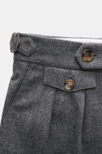 Close-up front view of Brunello Cucinelli Wool Pants Grey Melange showing double pleats, waistband button, and side adjusters in soft virgin wool fabric.