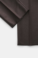 Incotex Woll-Jogpants braun meliert, Detailansicht offen Länge und Saum, reine Schurwolle, weicher Griff, Regular Fit, leicht schmal zulaufend, Reißverschluss, Bundknopf, elastischer Bund mit Tunnelzug, Taschen seitlich, Gesäßtaschen mit Knopf.
