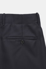 Incotex Wollhose navy Rückansicht mit Leistentaschen, Canvas aus reiner Wolle, weicher Griff, Tapered Fit, elastischer Bund, Bundknopf, Reißverschluss.