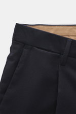 Close-up front view of Briglia 1949 Wool pants 'Tiberios' navy, twill pure new wool, slightly elastic, soft feel, tapered fit, regular thigh width, ankle length, very narrow tapering, zipper and waistband buttons, simple waistband pleat, French pockets, s