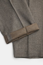 Briglia 1949 Wool Jogpants 'Wimbledon' grey/brown melange shown from a close-up top angle, highlighting the soft pure wool fabric and folded cuff. Italian style and high wearing comfort meet in these lightweight jogpants: tapered fit, regular thigh width,