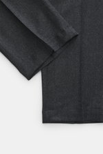 Close-up top view of the folded legs of Briglia 1949 Wool Jogpants 'Wimbledon' Anthracite Melange, showcasing pure wool fabric with a soft touch and lightweight quality. Italian style and high wearing comfort meet in the lightweight 'Wimbledon' jogpants b