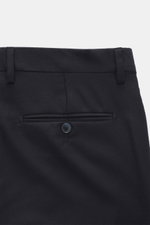 Close-up rear view of Briglia 1949 Wool pants 'Naviglio' navy melange showing back pockets with button, belt loops, and fine virgin wool fabric.

Description: <p>Soft touch meets timeless aesthetics: The 'Naviglio' pants by BRIGLIA 1949 combine high weari