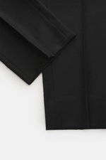 Close-up top-down view of Briglia 1949 Wool pants 'Naviglio' black showing soft-touch, fine twill virgin wool fabric with a slightly tapered, Regular Fit silhouette.