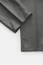 Nahaufnahme der Dondup Wollhose 'Spiritissimo' grau meliert, schmal zulaufend, Slim Fit, aus weichem, leicht elastischem Flanell-Schurwollstoff.